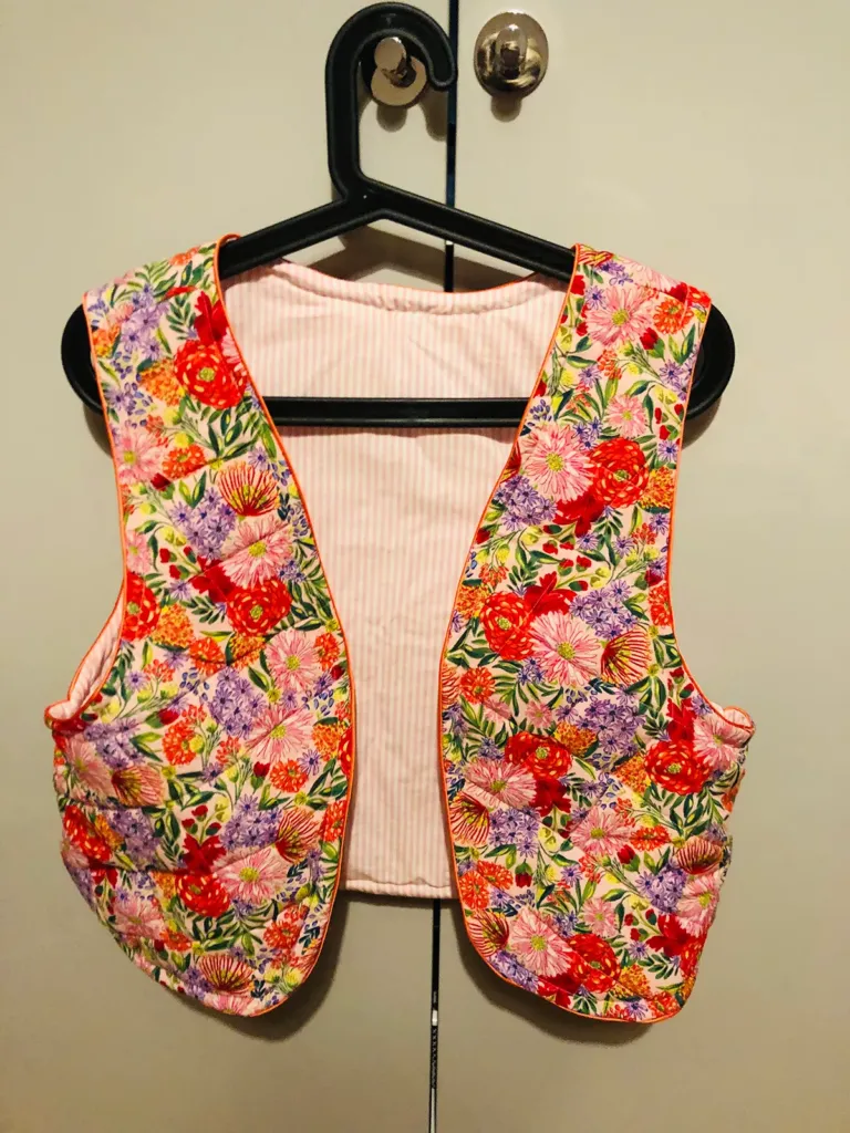 The first item of clothing I made with beautiful fabrics from Folk and Fibre and expert guidance from Noelle at Bomb! A quilted reversible gilet with orange piping - bright , floral pattern on one side and candy stripes on the inside. Love it and it’s inspired me to make more clothes with cute fabrics!